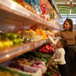 a-mother-and-a-child-in-a-market-choosing-fruit-and-vegetables.tmb-1200v.jpg